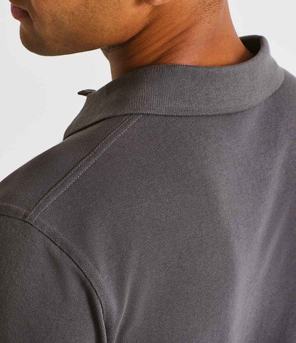 Premier Essential Unisex Polo Shirt PR995 in Dark Grey – model (4)